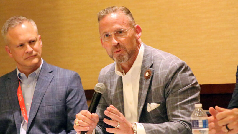 Pastor Clint Pressley speaks alongside other Southern Baptist Convention presidential candidates, June 10, 2024, in Indianapolis. Pastor Dan Spencer sits at left. (RNS Photo/Adelle M. Banks)