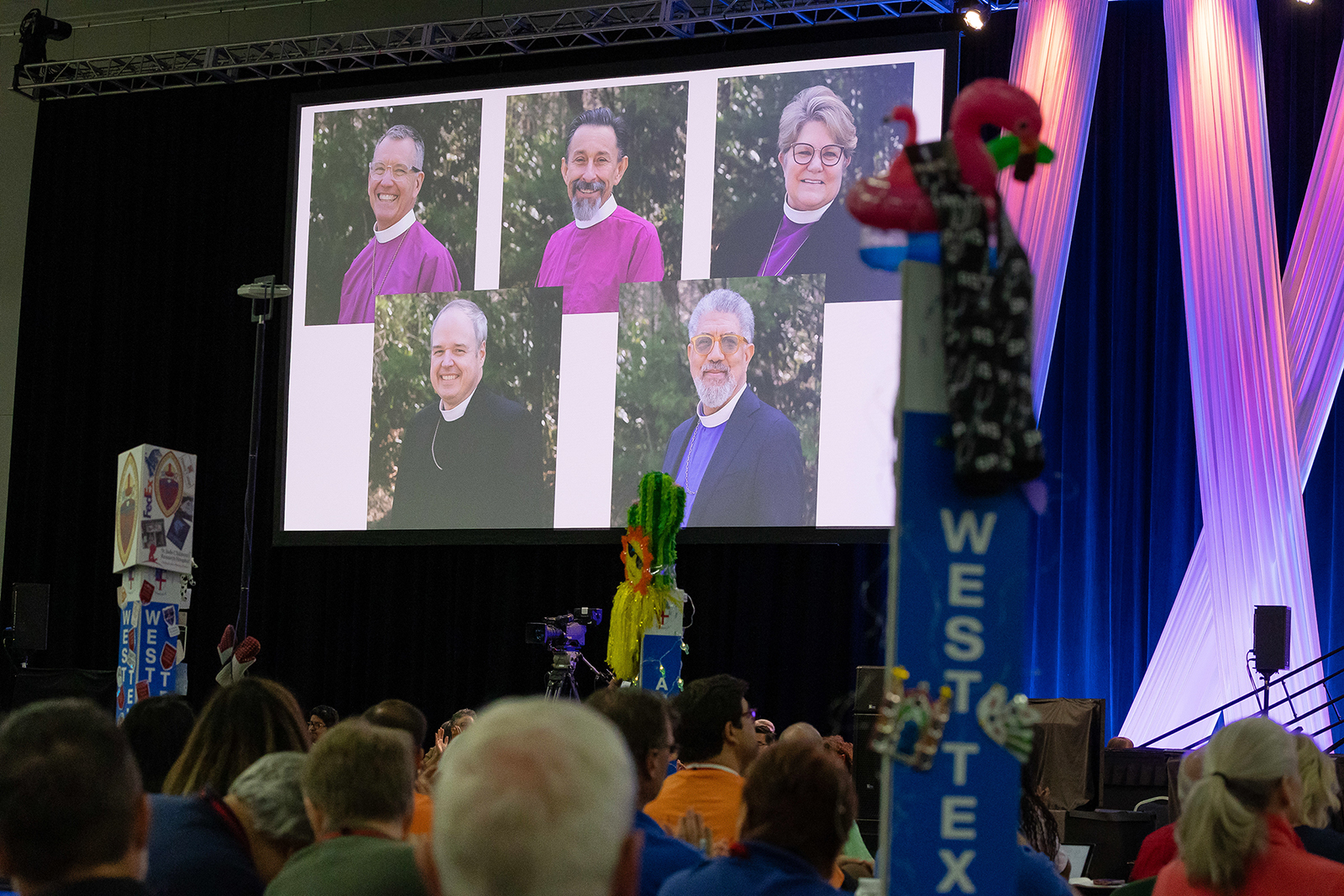 Nominees for presiding bishop are projected during the Episcopal Church General Convention in Louisville, Kentucky. (Photo by Randall Gornowich)